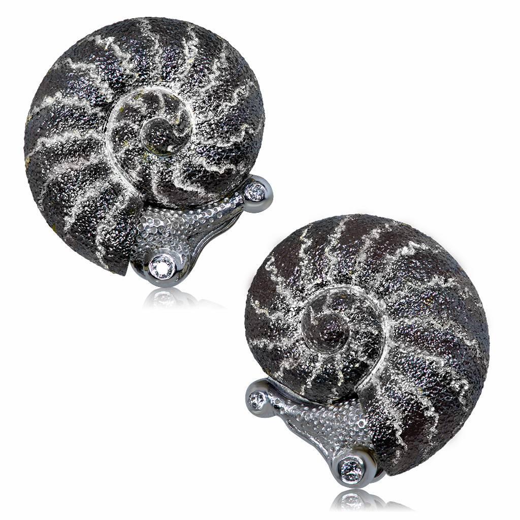 Alex Soldier Little Snail Earrings. Alex Soldier uses snails as a reminder to slow down and enjoy life. It became an instant classic and one of the brand’s signature heirlooms with the quality and appeal of the most sought-after jewels in the world.