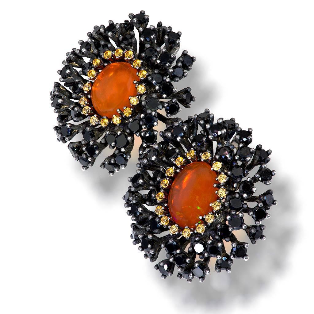 Alex Soldier Fire Opal Earrings feature 18 carats of fire opal, 13.2 carats of black spinel and 0.8 carats of garnets. Made in sterling silver infused with dark platinum. Handmade in New York City. One of a kind. Complimentary conversion to clip on