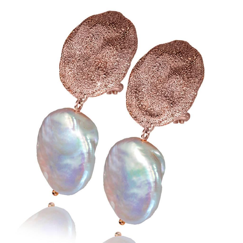 Alex Soldier Drop Dangle Moneta Pearl Earrings are made in silver, infused (deeply plated) with 18 karat rose gold with Freshwater pearls and signature metalwork that creates an effect of inner sparkle. Handmade in NYC. Please keep away from water,