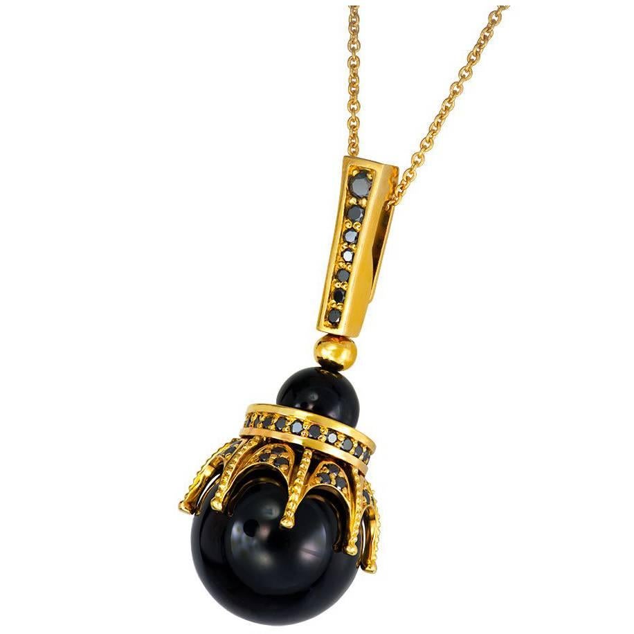 Alex Soldier Crown Drop Pendant in 18 karat yellow gold with 2 carats of black onyx and 0.5 carats of black diamonds suspended on 18-inch 18 karat gold chain. Handmade in NYC. One of a kind. 