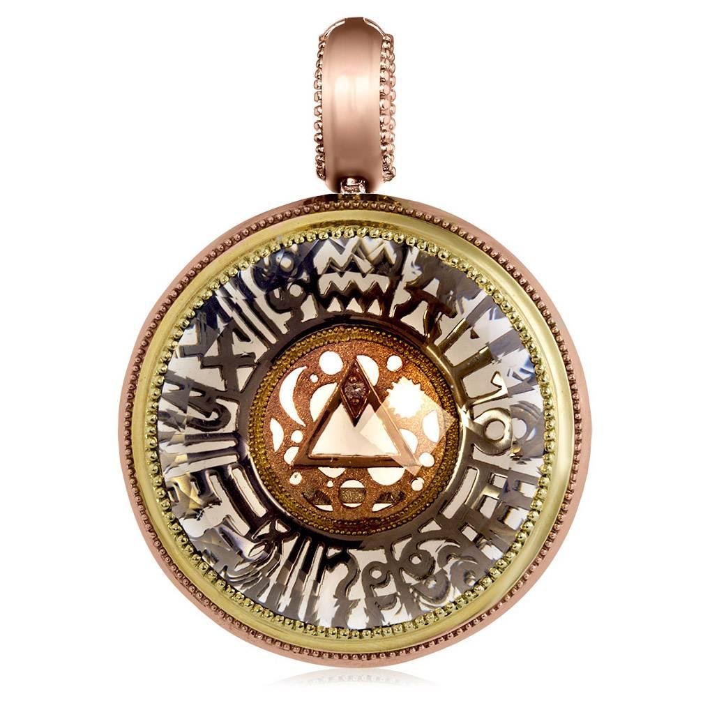 Alex Soldier's Talisman pendant is an embodiment of mysterious allure, it represents our connection to the universe. Made in 18 karat gold with smoky topaz, the pendant consists of 10 separate components and presents an intricate integration of