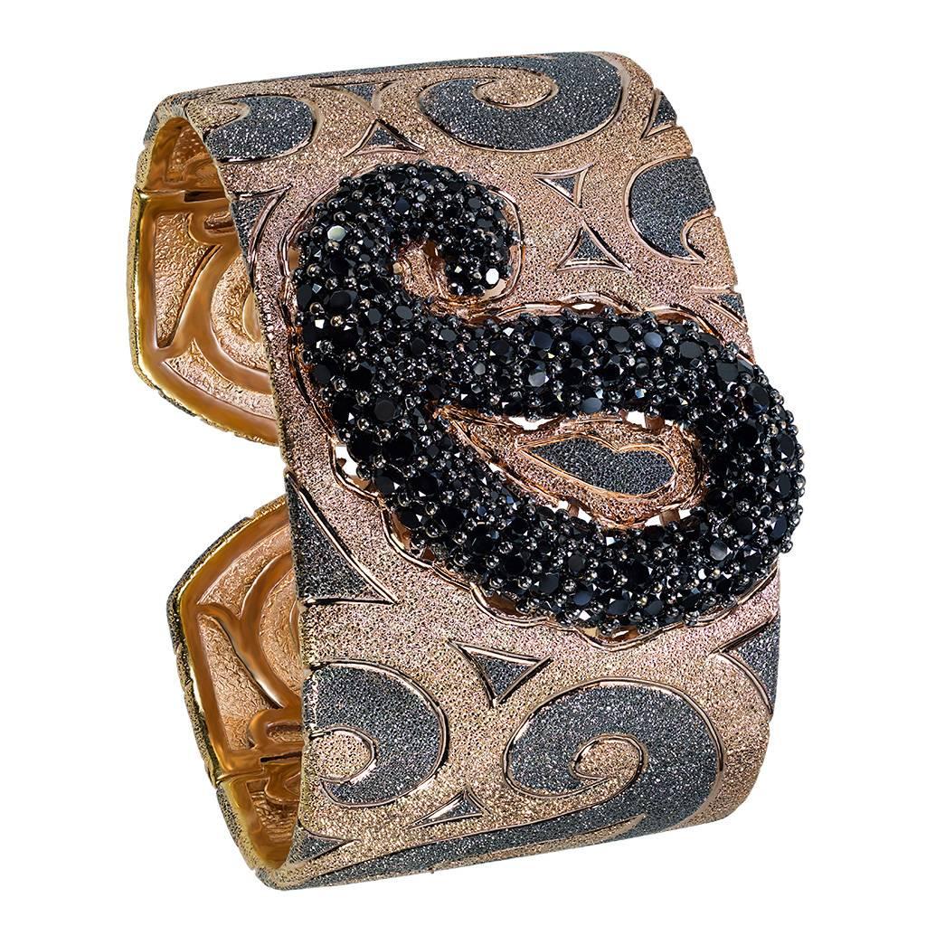 Alex Soldier Black Spinel Cuff with paisley pattern: Made in sterling silver with 18k rose gold and platinum (rhodium) infusion (deep plating) with black spinel (15 ct). Handmade in NYC, the cuff features double hinges for extra comfort and is