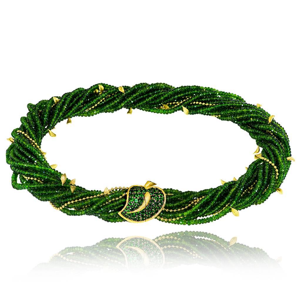 Alex Soldier Green Leaf Necklace is a stunning work of art made in 18 karat yellow gold with 5 carats of tsavorites (green garnets) and 800 carats of Siberian chrome diopside beads, also known as Siberian emerald. The necklace holds 5 gold chains