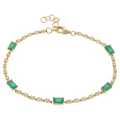 Bracelet en or jaune 14KT avec lignes alternées d'émeraudes et de diamants