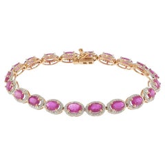 Bracelet en or rose 14KT avec halo de rubis ovales et de diamants