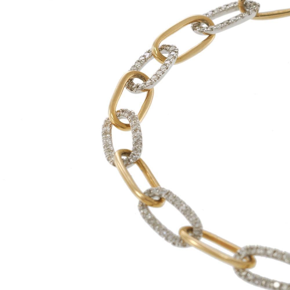 Reinterpretazione audace dell'amata Silhouette, questo bracciale è realizzato in ricco oro 14KT bicolore e ornato da maglie con pavé di diamanti alternati. Il design alterna l'elegante oro giallo lucidato a scintillanti ovali tempestati di diamanti,
