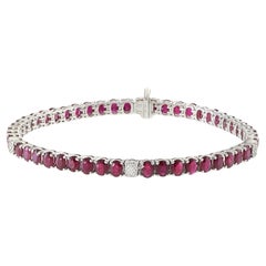 Bracelet de tennis en or blanc 18KT avec rubis et diamants