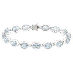 Bracciale tennis in oro bianco 14KT con acquamarina ovale