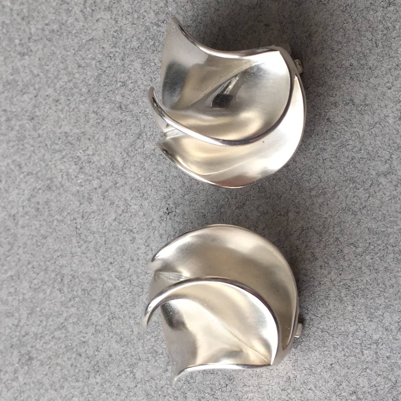 Georg Jensen Modernist Earrings No 367 by Nanna Ditzel

Rare design, beautiful scale. Comfortable clip ons. Post can be added.

Sterling Silver

Denmark