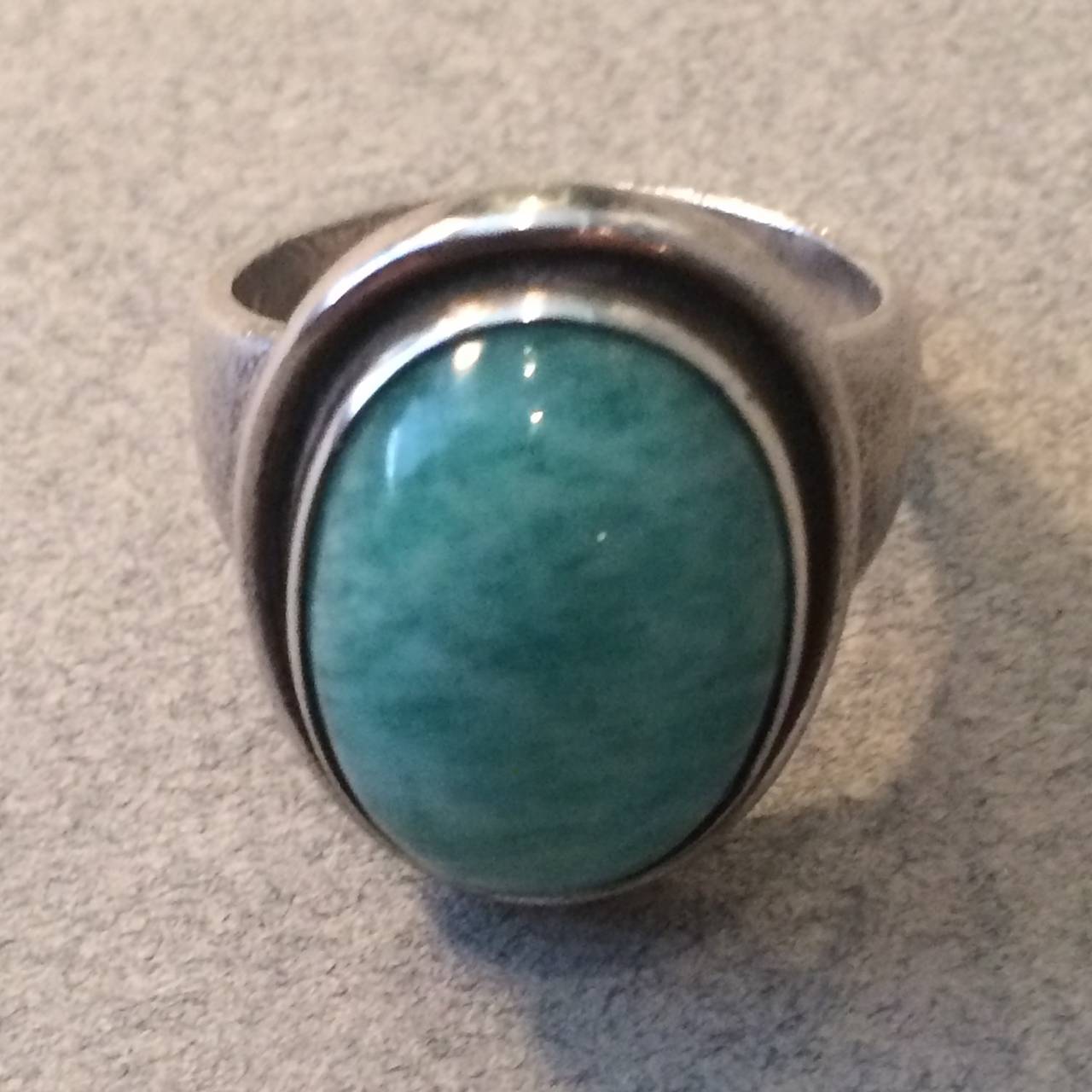Georg Jensen Ring No 46A with Amazonite cabochon.

Seldom seen with this stone. Excellent condition. Circa 1945.

Size 7.5