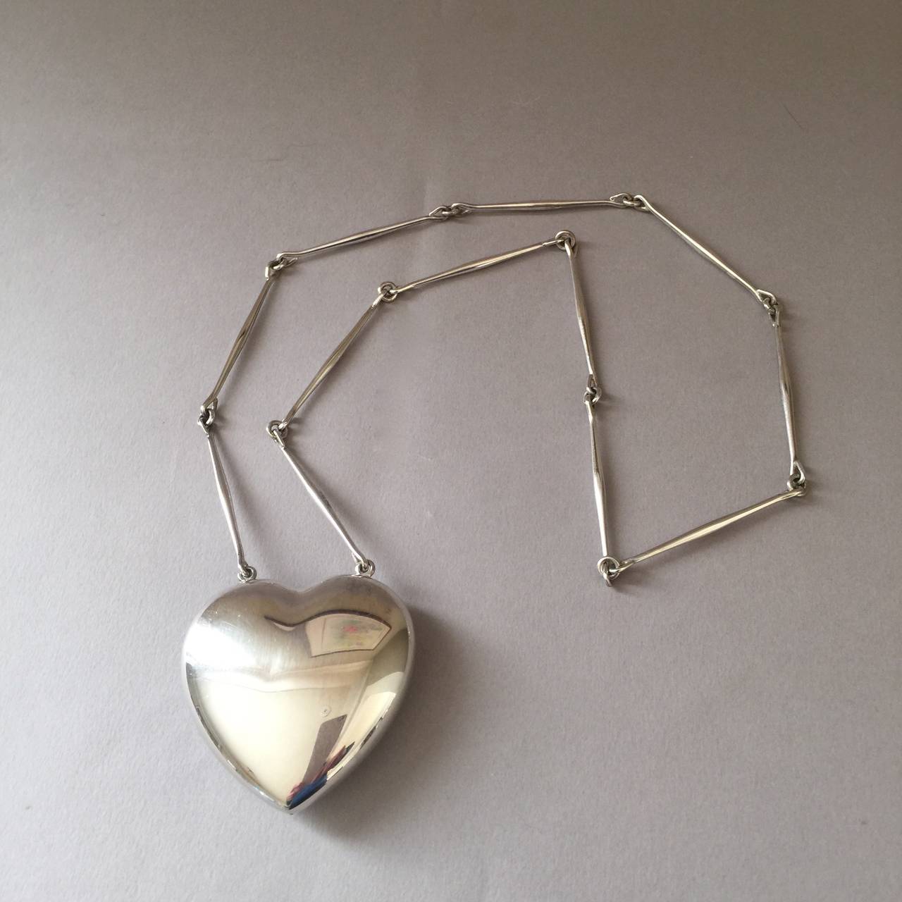 Georg Jensen Heart Necklace by Astrid Fog, no. 126

Designed by Astrid Fog. Bold statement piece. Heavy-gauge sterling silver with hand-made links. 

28