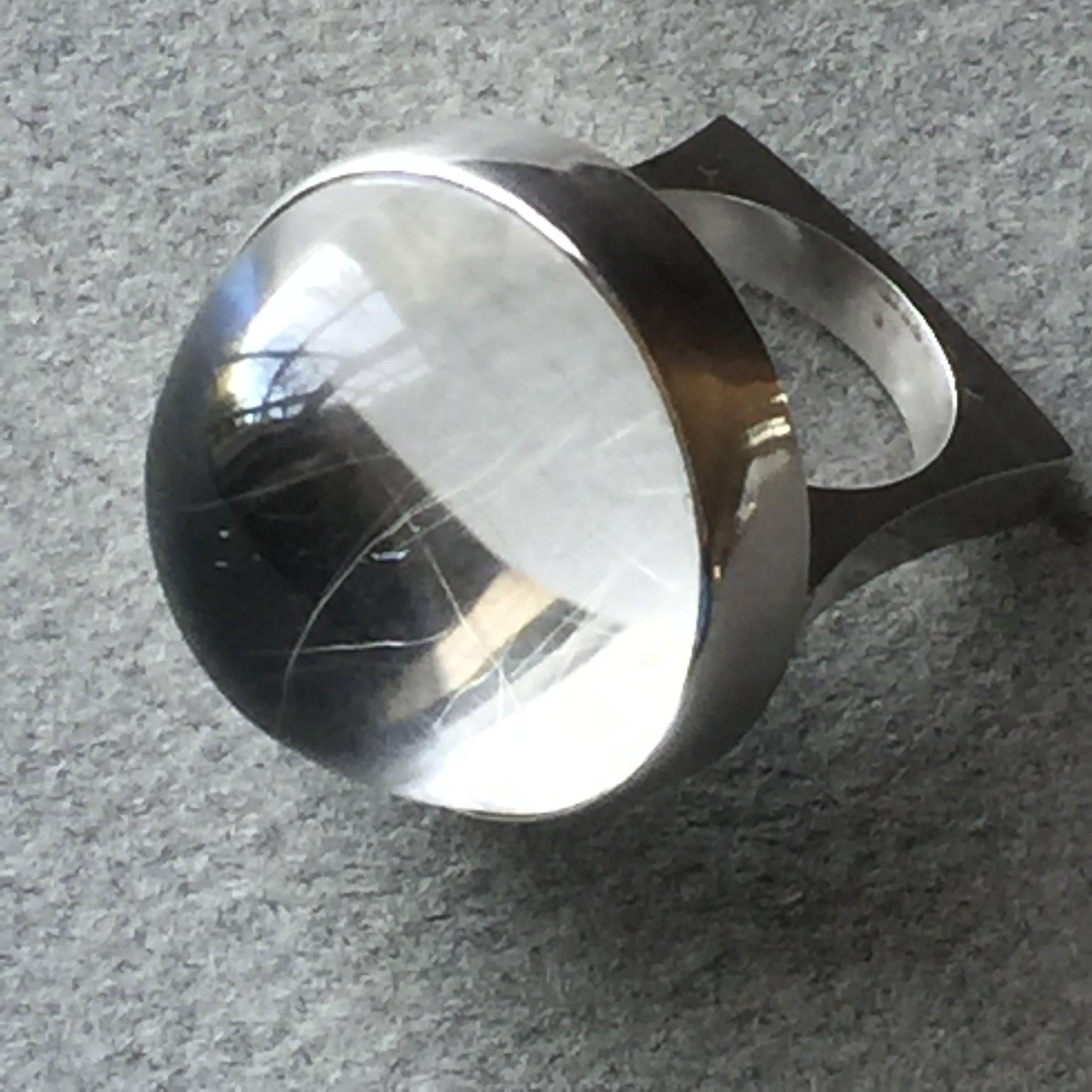 Georg Jensen Sterling Silver Ring No. 169 with rutilated quartz cabochon with butterfly inclusions by Bent Gabrielsen. Sleek bold modernist design with gem quality rutilated quartz and unique shank. Size 5.25