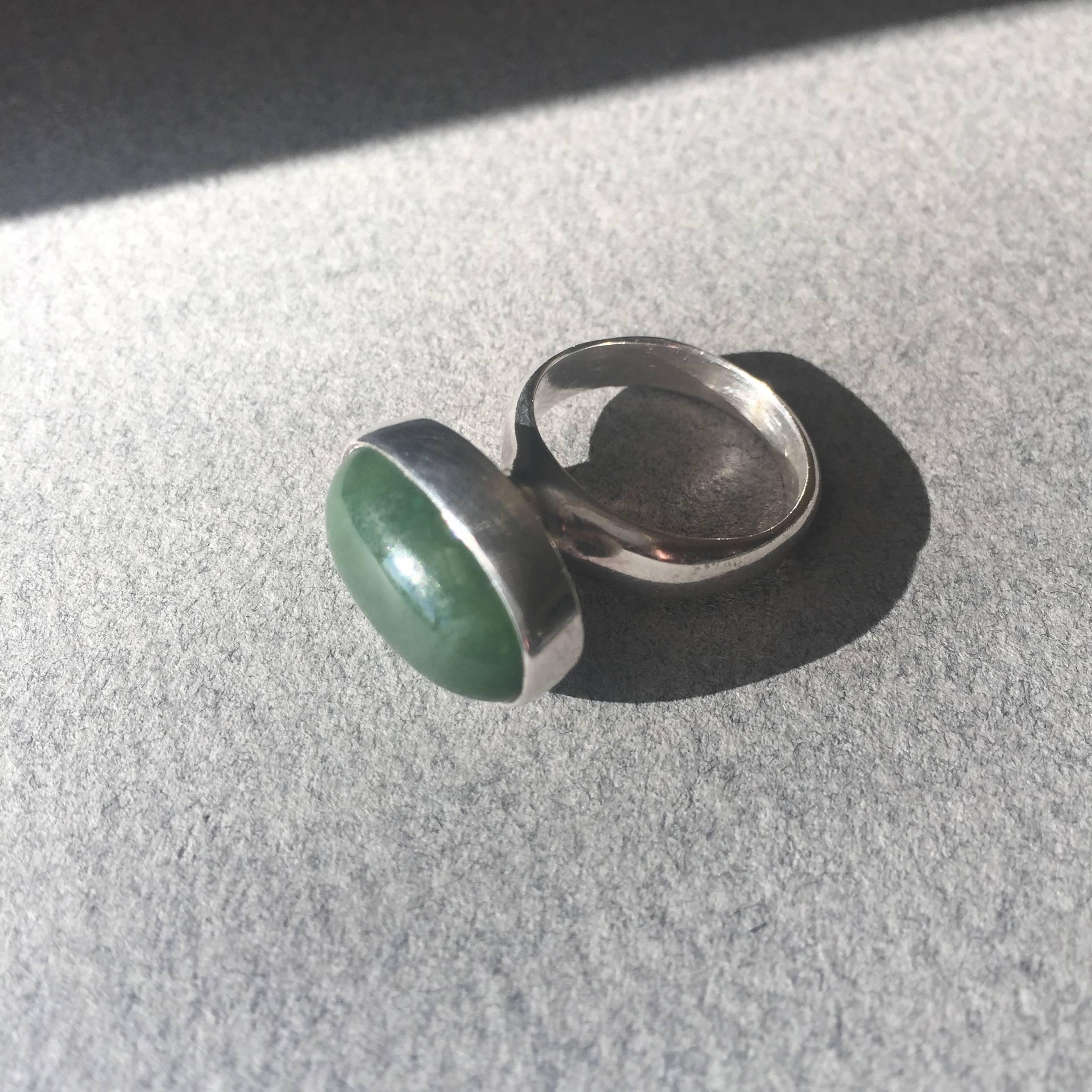 Georg Jensen Sterling Silver Ring No. 123B by Nanna Ditzel with Natural Jade Cabochon Stone.

Sleek modernist design.  Size 5.75

Complimentary gift box and FREE shipping included.

About the designer:
Nanna Ditzel (1923-2005) Denmark’s most