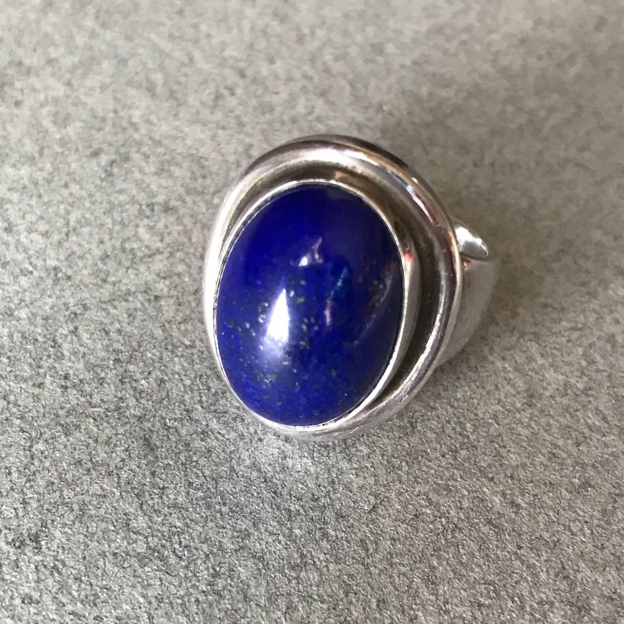 Georg Jensen Sterling Silver Lapis Lazuli Ring No. 46A by Harald Nielsen.

 

The gemstone has a deep, rich color. Stunning sterling silver ring in excellent condition.

 

Designer:Harald Nielsen Maker:Georg Jensen Design #:46A Circa:post 1945
