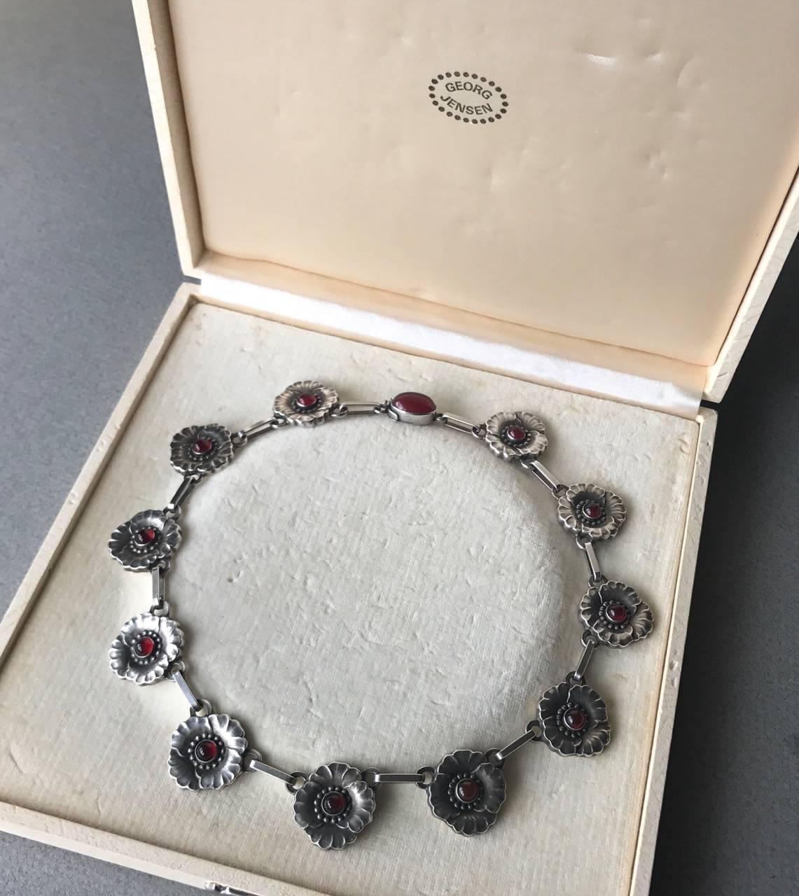 Georg Jensen Sterling Silver Flower Necklace No 30A With Carnelian Cabochons 

Mint Condition.
Complimentary gift box included with purchase.