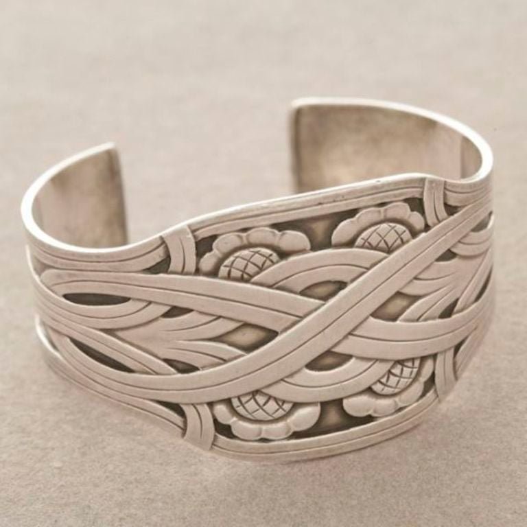 Georg Jensen Sterling Silver Cuff by Harald Nielsen, No. 55.

Designed n in 1935 with hallmarks from 1933-44. Fits larger wrist up to 8