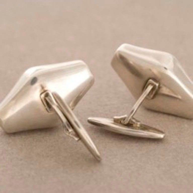Georg Jensen Sterling Silver Modernist Cufflinks by Kim Naver No. 250.

Circa 1970s.

Dimensions: 1.25"L x .75" W

Complimentary gift box and FREE shipping included.