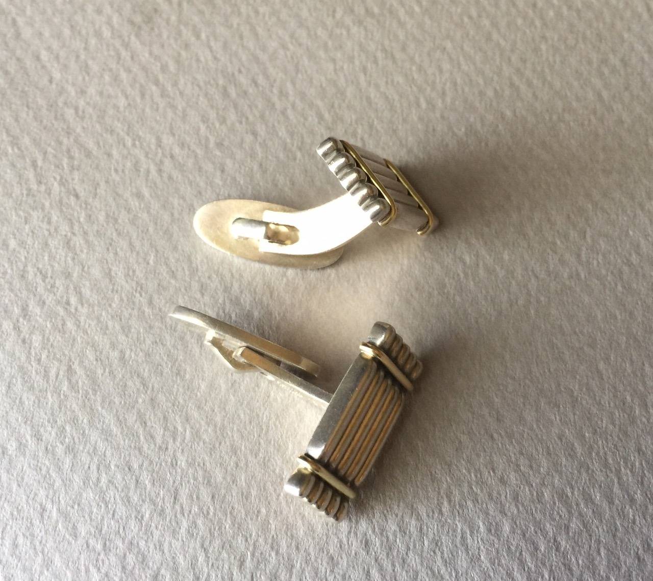 Georg Jensen 18K Gold and Silver Cufflinks No. 156.

Sterling silver and 18 karat gold cufflinks designed by Lene Munthe. 

These cufflinks are in excellent condition and come with the original Georg Jensen box.