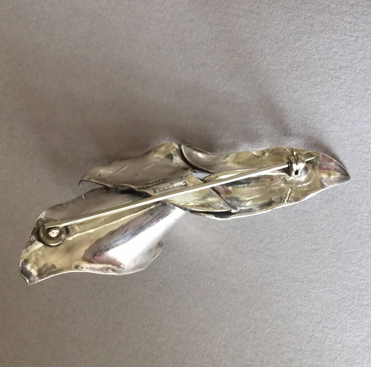Signed and hallmarked hand wrought Peer Smed sterling silver. Highly sculptural and very three dimensional as if it was the actual flower.

Complimentary gift box and FREE shipping included.

About the artist:
Peer Smed (born Peer Schmidt) was born
