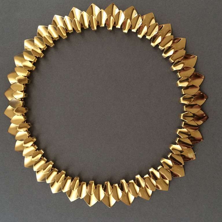 Georg Jensen 18KT Gold Necklace No. 1033 by Tuk Fischer,  Very Rare.

Designed in 1963

Georg Jensen Modernist Necklace by Tuk Fischer, no. 133 

Very rare design with dramatic intricate layers of handmade highly polished gold segments that