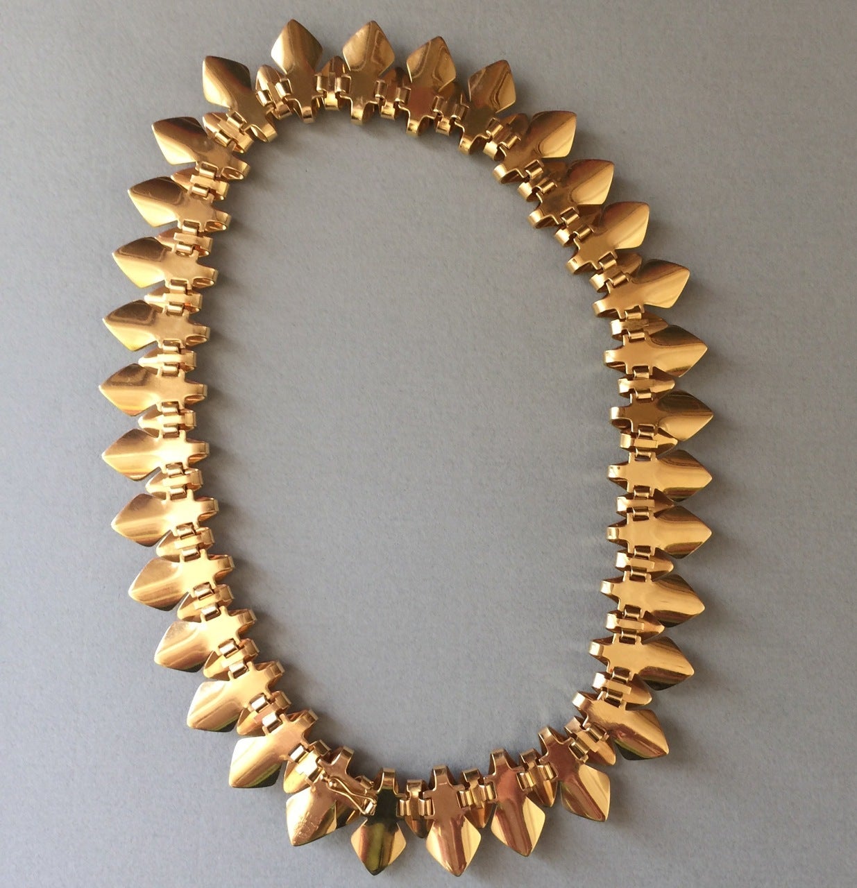 Georg Jensen 18KT Gold Necklace No. 1133 By Tuk Fischer.

Very Rare

Designed in 1963.

Very rare design with dramatic layers of highly polished handmade gold segments that create a 3-D effect. Invisible clasp. Excellent condition. 

96 grams of