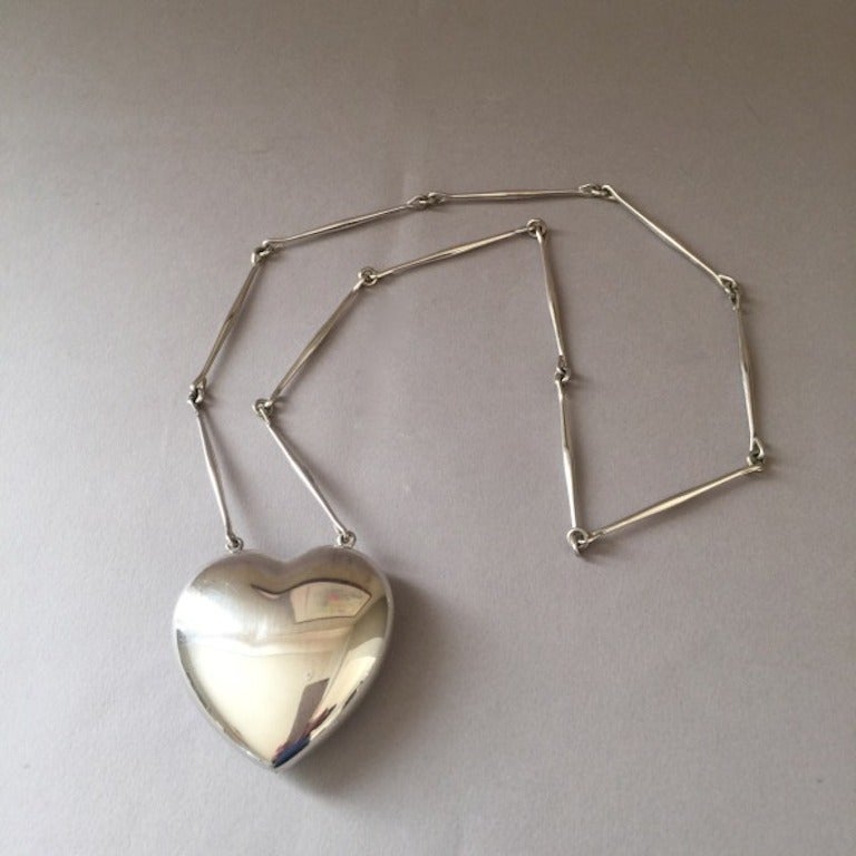 Georg Jensen Sterling Silver Heart Necklace No. 126 by Astrid Fog

Bold and unique statement piece. Heavy-gauge sterling silver with hand-made links. 

28