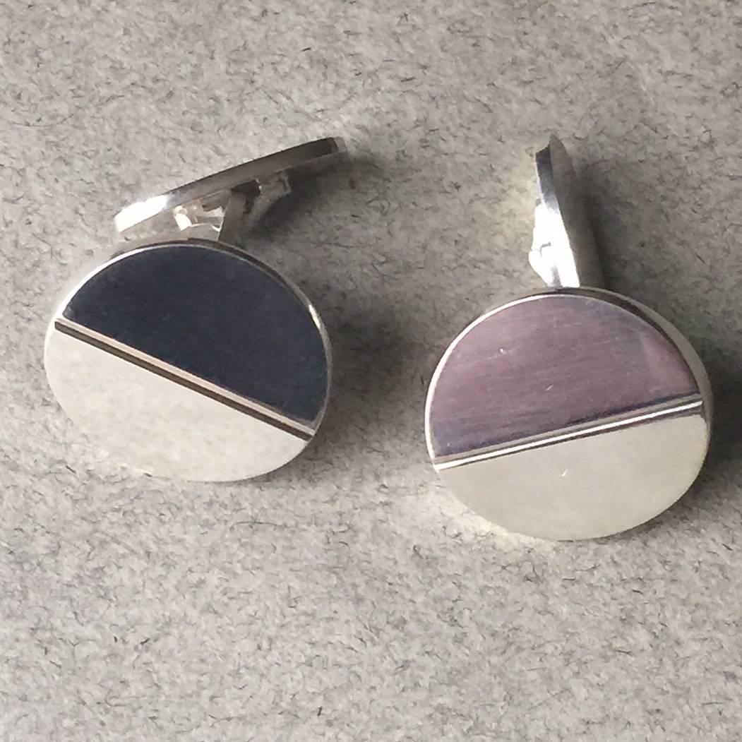 Georg Jensen Sterling Silver Cufflinks No. 106 by Andreas Mikkelsen

Round, sterling silver, modernist cufflinks in excellent condition. Due to the angles of the sterling silver, these cufflinks have an interesting reflective quality.

Complimentary