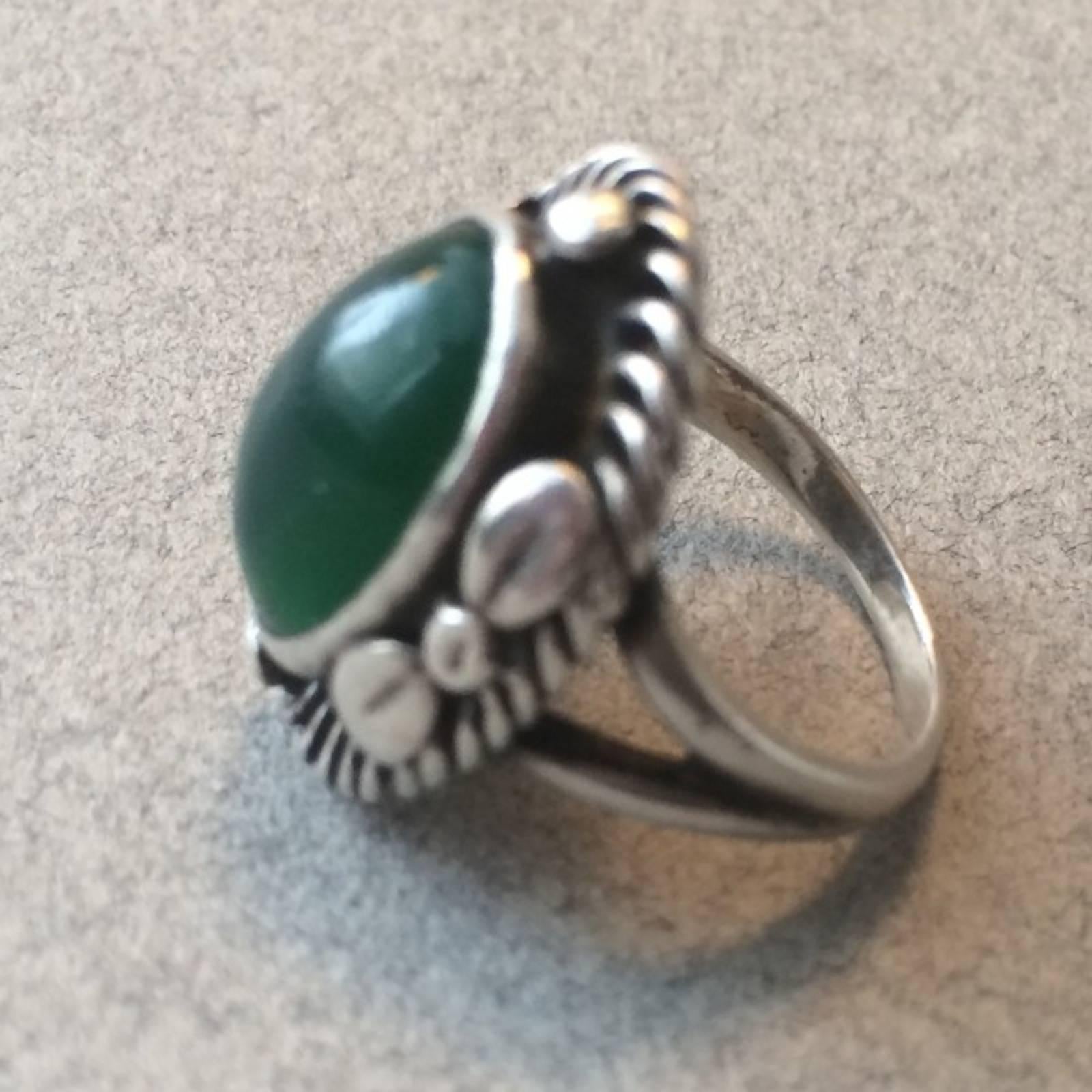 Georg Jensen 830 Silver  Green Agate Cabochon ring No. 1.

Size 5.5. Oval top: .75