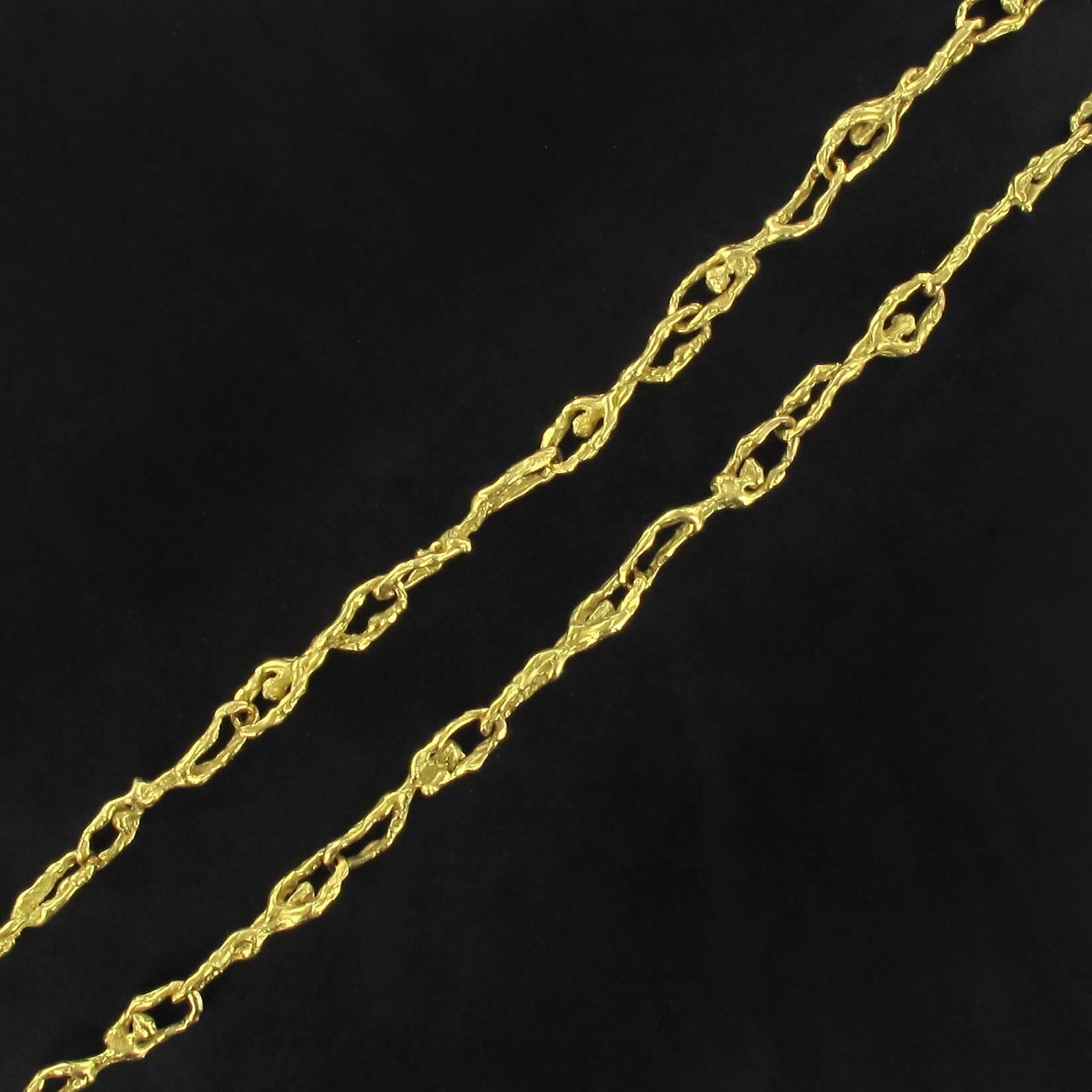 Modernist Gold Necklace with Character Motifs