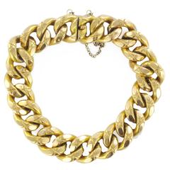 French 19th Century Chiselled Gold Charm Bracelet
