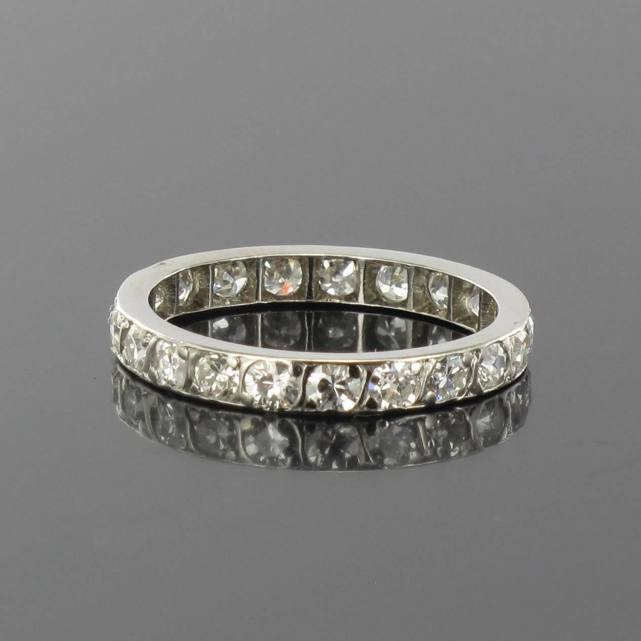 Ring in platinium.  
This splendid platinium eternity ring features brilliant cut diamonds.
Total weight of diamonds: 1 carat about. 
Weight: approximately 2 g. 
Width: 2,6 mm 
US Size : 5,5, Other size, please contact us.  
Our opinion : Displaying