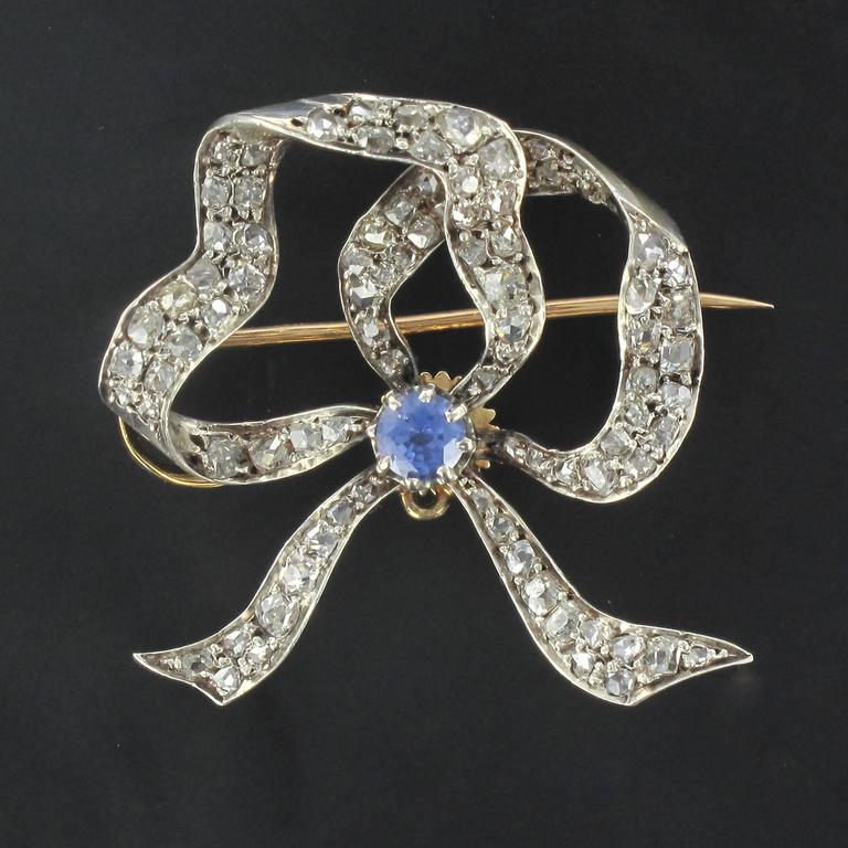 Pair of Antique Sapphire Diamond Brooches at 1stDibs diamond brooches