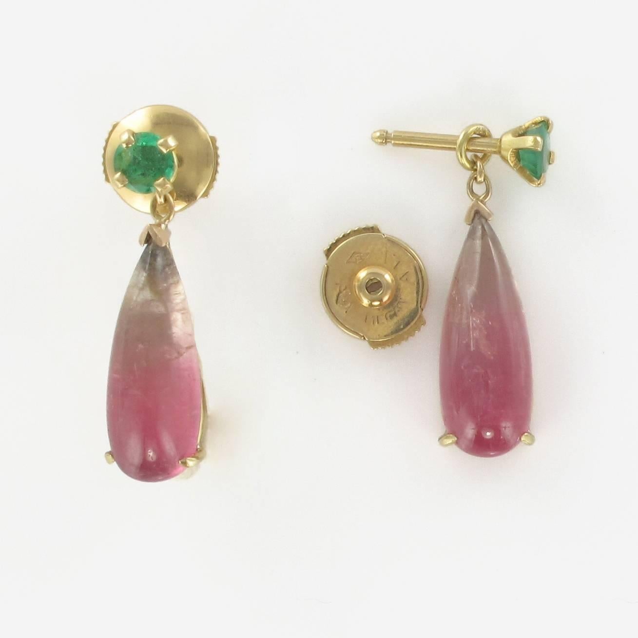Baume creation - unique piece.
Earrings in 18 carat yellow gold, eagle head hallmark. 
These charming earrings are composed of yellow gold stud earrings each set with a round facetted emerald. A Melon Tourmaline cabochon teardrop is suspended from