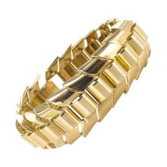 Gold articulated tank bracelet with ears of wheat links 10