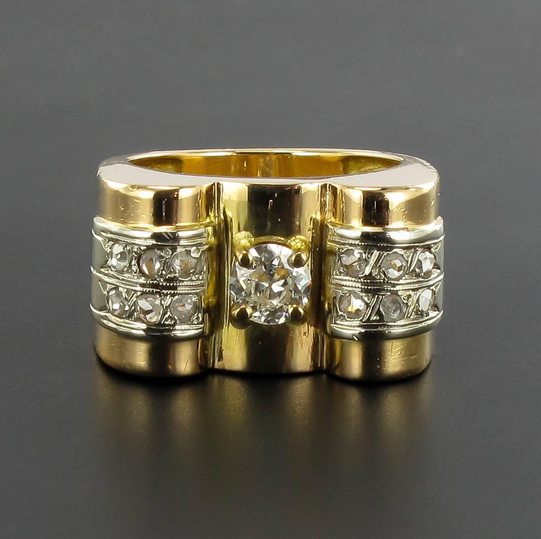 Ring in 18 carat yellow gold. 

This splendid geometric tank ring is claw set with a brilliant cut round diamond. 2 rows of rose cut diamonds are set on each side. 

Total diamond weight: 0.45 carat approximately.
Length: 22,12 mm, Width: 12,07 mm,