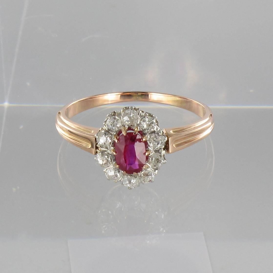Ring in 18k rose gold, eagle head hallmark.

This ravishing antique ring could be described as femininity incarnate! The centrepiece is a ruby with raspberry tints that harmonises beautifully with the rose gold of the ring band. 10 perfectly