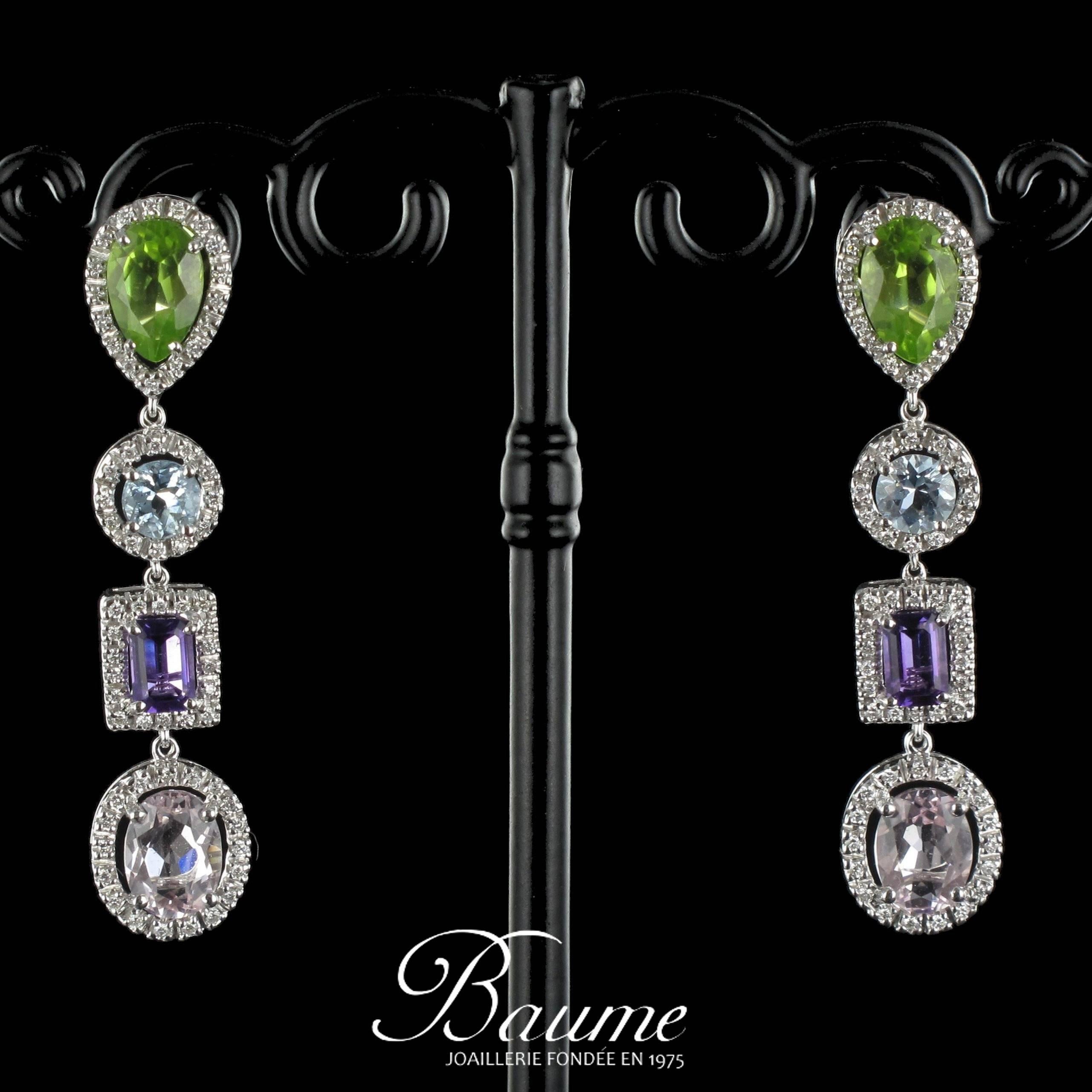 For pierced ears. Pair of earrings in 18 carat white gold.

Each earring is set with a pear shaped peridot surrounded by diamonds holding a suspended round aquamarine surrounded by diamonds, an emerald cut amethyst surrounded by diamonds and an