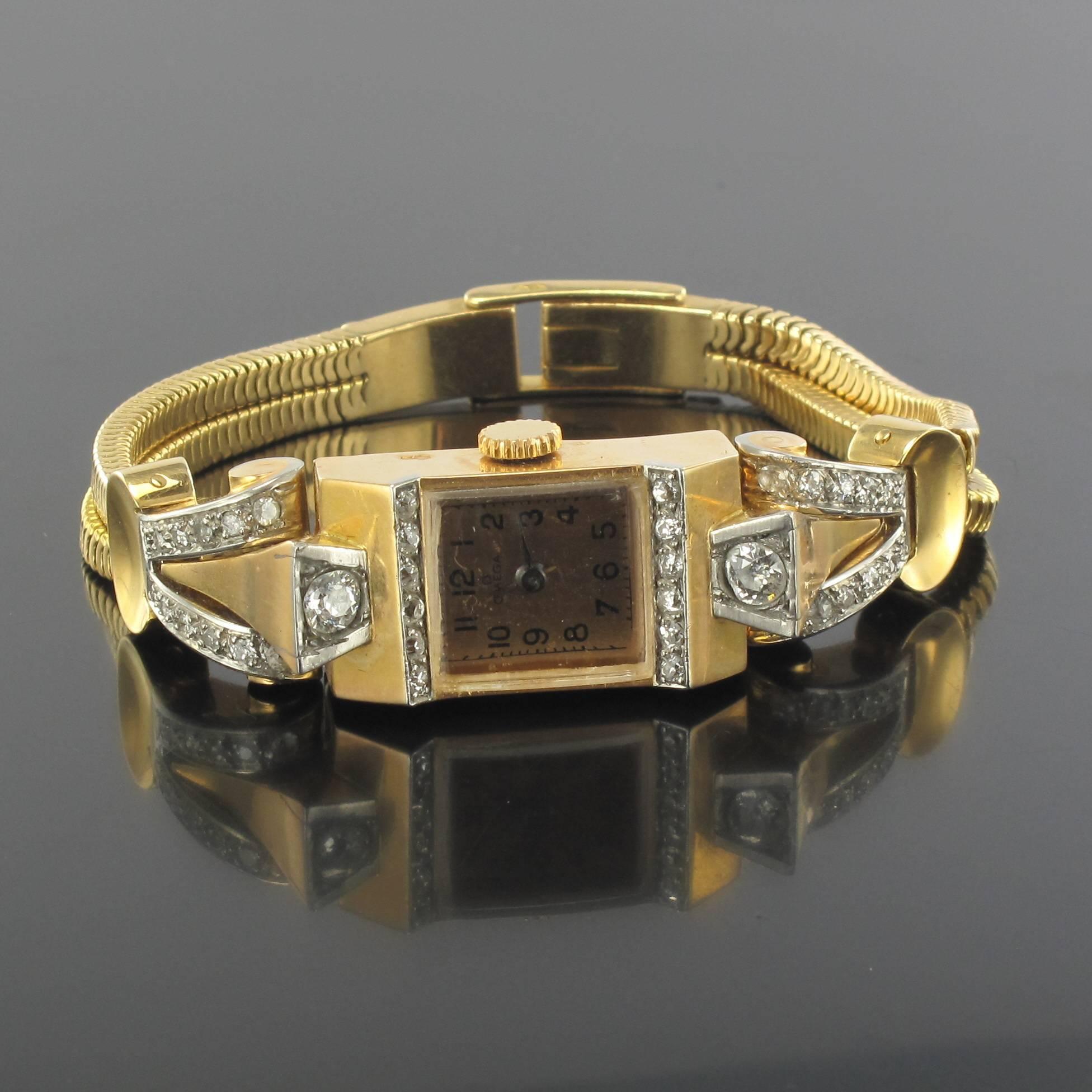 1940s Gold and Diamond Omega Watch 11