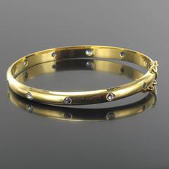 Yellow Gold and Sapphire Bangle Bracelet