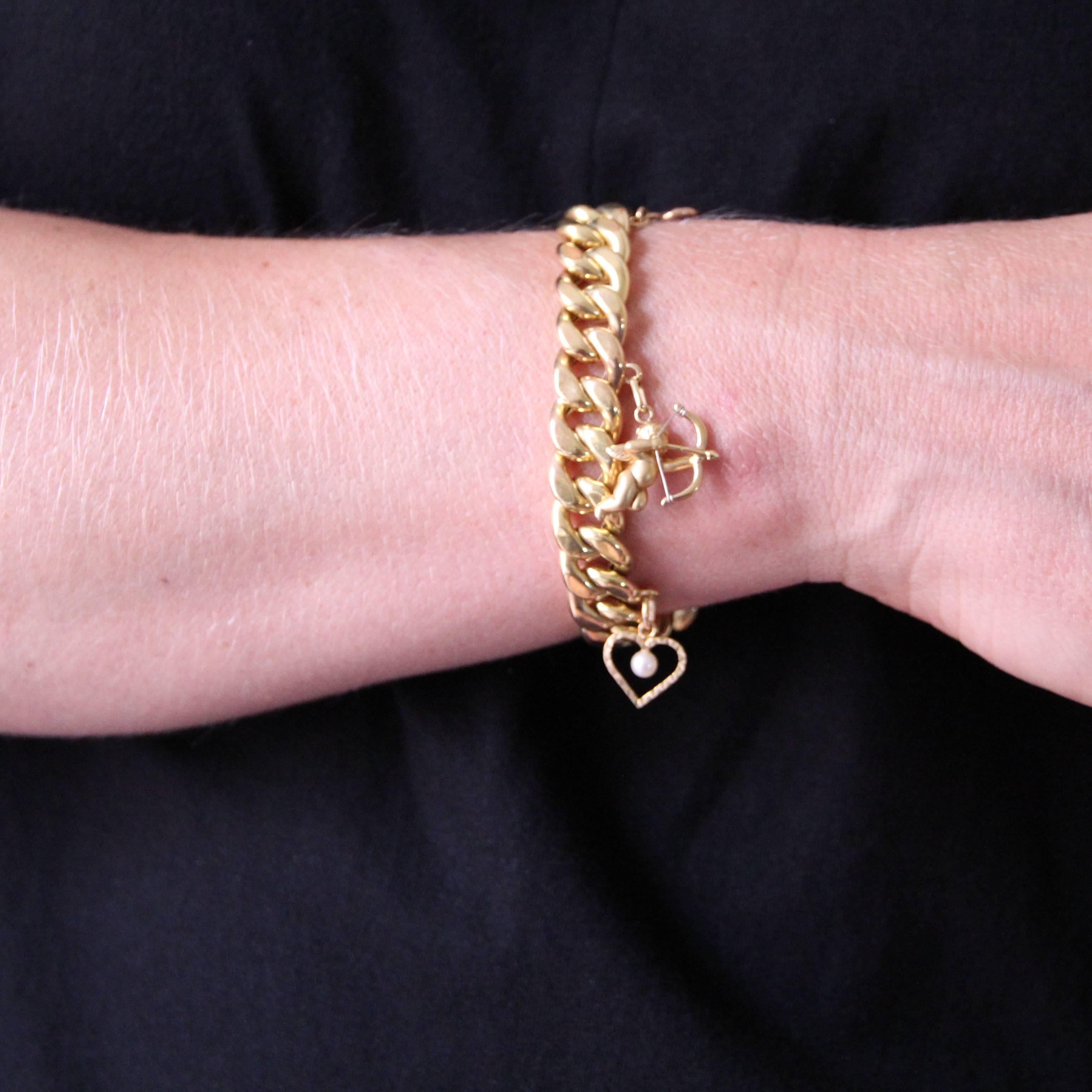 Gold 5 Charm Bracelet In Excellent Condition In Poitiers, FR