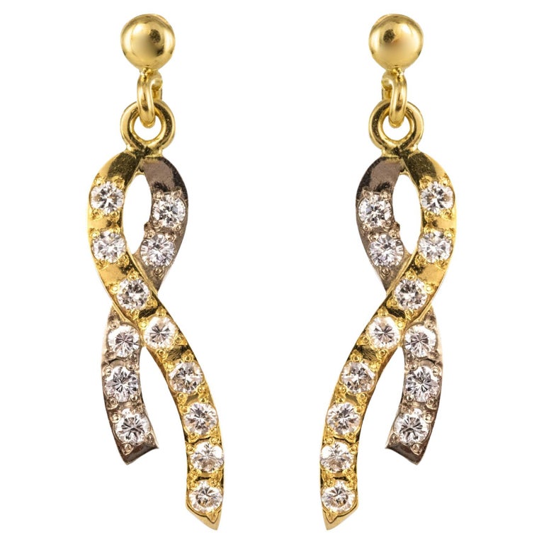 Modern Diamond 18 Karat Yellow White Gold Ribbon Earrings at 1stDibs