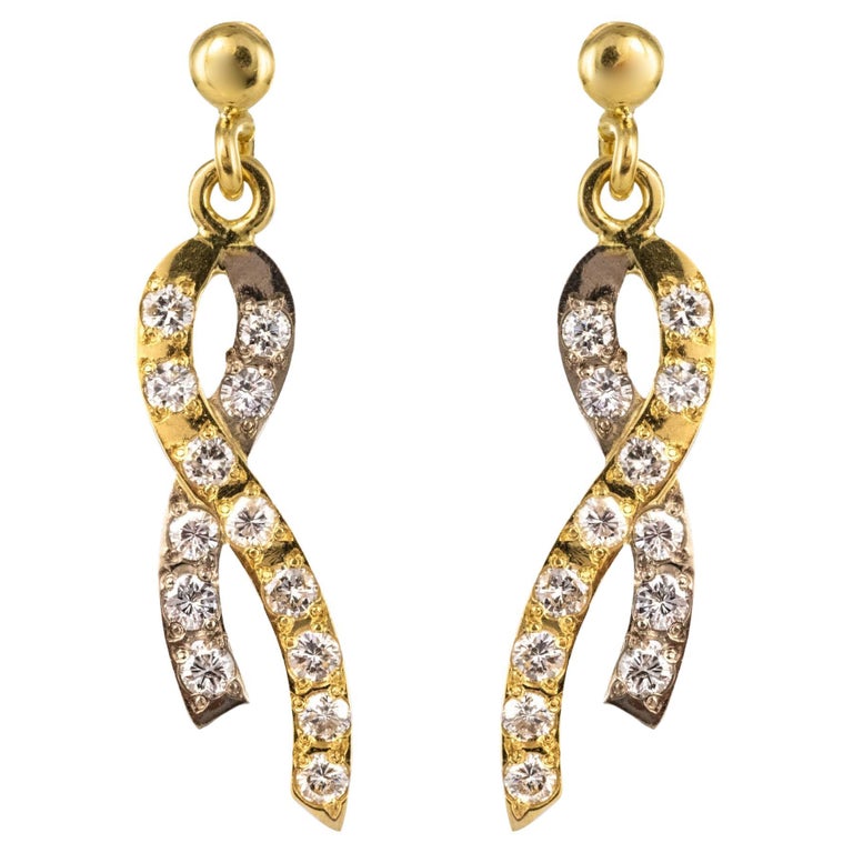 Modern Diamond 18 Karat Yellow White Gold Ribbon Earrings at 1stDibs