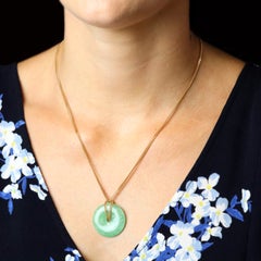 Modern Second-Hand Jade Disc 18 Karat Yellow Gold Chain Necklace