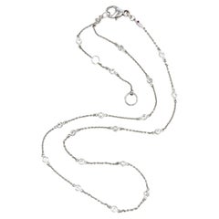 Collar «Station» de Roberto Coin, en oro blanco de 18 quilates y diamantes