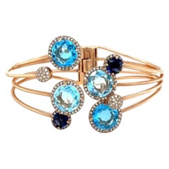 Bracelet manchette avec Effy, topaze bleue, iolite et diamants, en or rose 14 carats