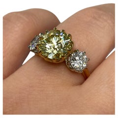 3.08 Fancy Yellow Cushion Brilliant Cut Diamond and Old Euro Cut Diamond Ring