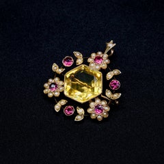Colgante floral antiguo de la época eduardiana, de oro amarillo de 9 quilates, con citrino, granate y perlas, y...