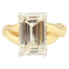 3.90 Carat Emerald Cut Diamond 18 Karat Yellow Gold and Platinum Engagement Ring