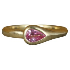 0.49 Carat Pear-Shaped Pink Sapphire Asymmetrical Ring