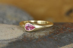 0.49 Carat Pear-Shaped Pink Sapphire Asymmetrical Ring